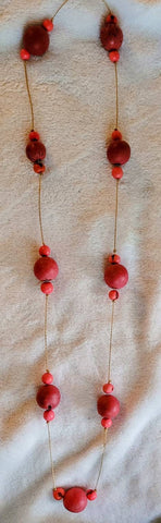 POPPING Pink Wood Beads Suspended in this 36 inch Vintage Necklace  circa 80s