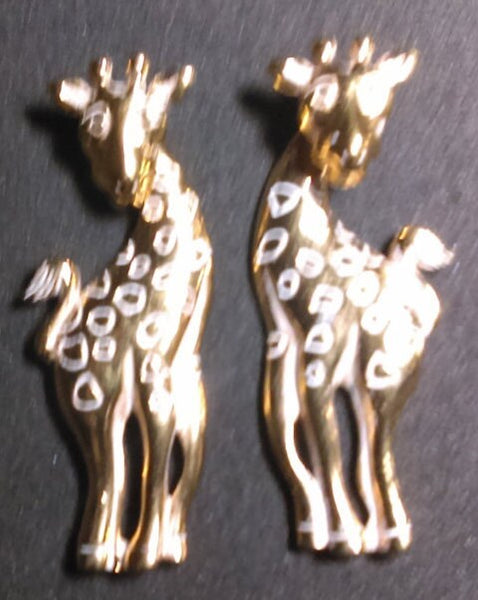 Avon'S Moving Gold Giraffe's