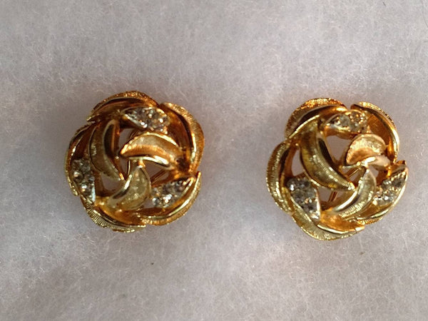 Earrings in Classic Swirl Design by BSK. Garnish with Rhinestones. .