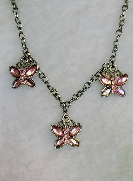 Staggering Pin in Pink Butterfly Motif