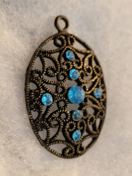 Island Blus Antiqued Gold Scroll Pendant