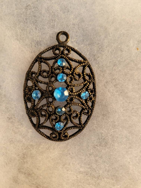 Island Blus Antiqued Gold Scroll Pendant