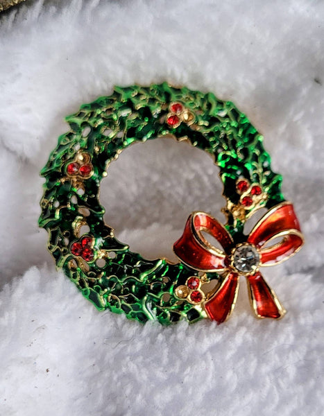 Red Ribbon Wreath in a Vintage Goldtone setting.