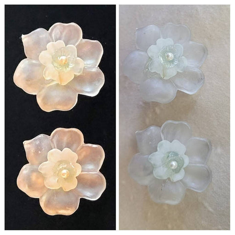 Frosted Iluminating Flower Earrings.  Fifties Plastics Pearl center.  Fantastic material allows color light Illuminating a Amazing Soft Glow