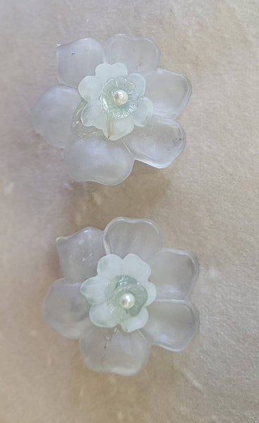 Frosted Iluminating Flower Earrings.  Fifties Plastics Pearl center.  Fantastic material allows color light Illuminating a Amazing Soft Glow