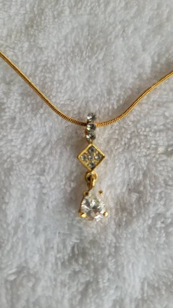 Dazzling Diamante Necklace Feature Pronged Crystal  Rhinestones on Gold.