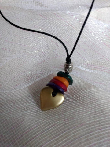 Brushed Geart with Muti Color Lucite Disc on Leatherette 20 inches The Heart Feature is 4 more inches