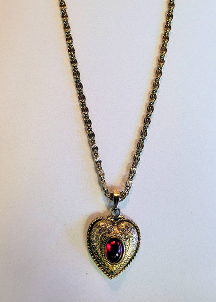 SOLD...Vintage Valentines Exquisite Gold Scrooled Heart Pendant  Center with Ruby Red Oval Rhinestone. The Chain is ornate interlocking Gold