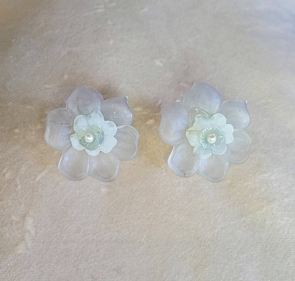 Frosted Iluminating Flower Earrings.  Fifties Plastics Pearl center.  Fantastic material allows color light Illuminating a Amazing Soft Glow