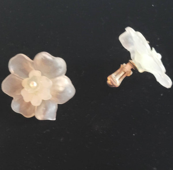 Frosted Iluminating Flower Earrings.  Fifties Plastics Pearl center.  Fantastic material allows color light Illuminating a Amazing Soft Glow