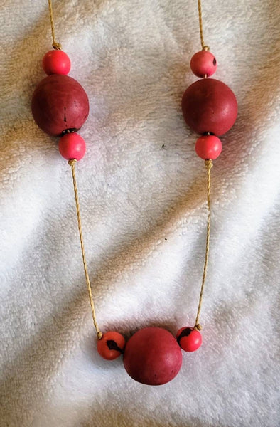 POPPING Pink Wood Beads Suspended in this 36 inch Vintage Necklace  circa 80s