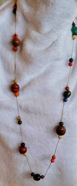 Wood Necklace Colored Ball Shapes Spaced and Suspended Wear with  Multiple Options. 40 in. Into The Woods Collection.