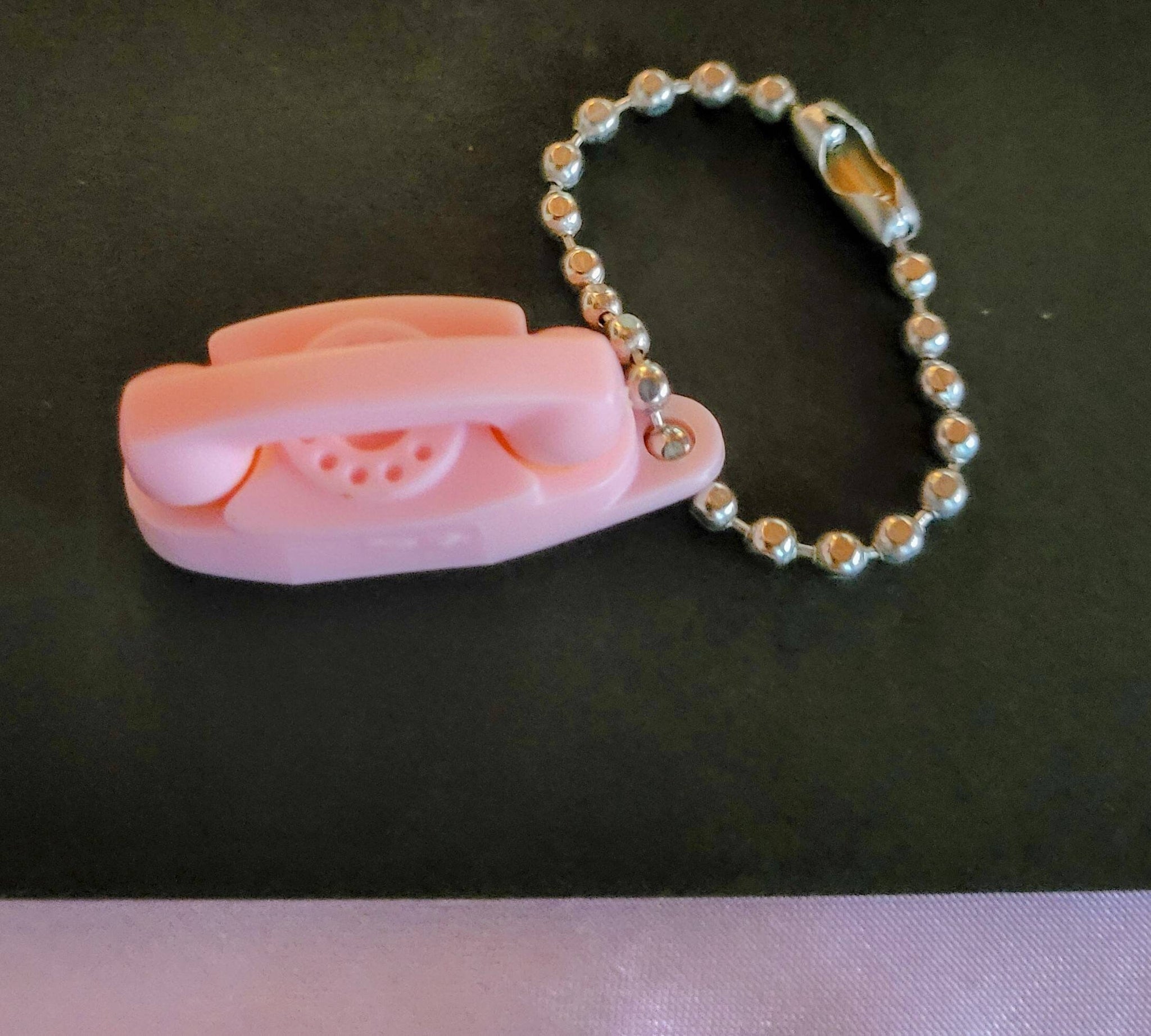 Princess Phone It's Little It's Lovely and It Lights..! These Keychains were Treasures Especially when You got Your Phone 1960 Dream Indeed