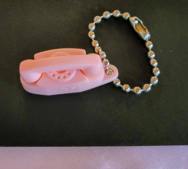 Princess Phone It's Little It's Lovely and It Lights..! These Keychains were Treasures Especially when You got Your Phone 1960 Dream Indeed