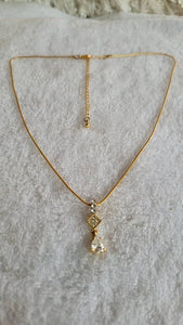 Dazzling Diamante Necklace Feature Pronged Crystal  Rhinestones on Gold.