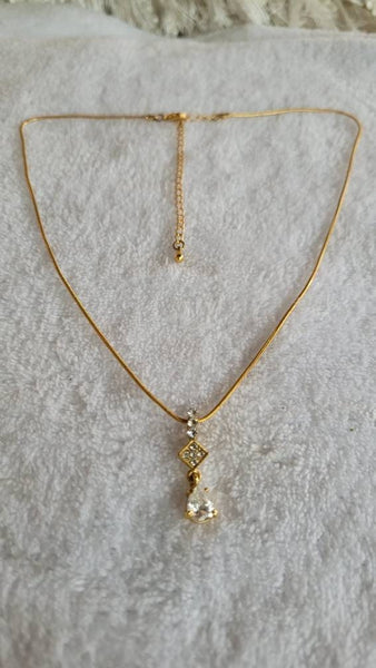 Dazzling Diamante Necklace Feature Pronged Crystal  Rhinestones on Gold.