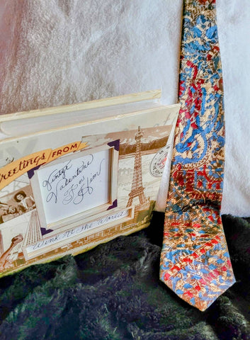 Solidly in the Sixties A Style... Colors...Scream It. Almost Paisley like. Have FUN with Vintage Ties... As Belts On Hats Shake It Up..!