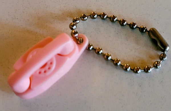 Princess Phone It's Little It's Lovely and It Lights..! These Keychains were Treasures Especially when You got Your Phone 1960 Dream Indeed
