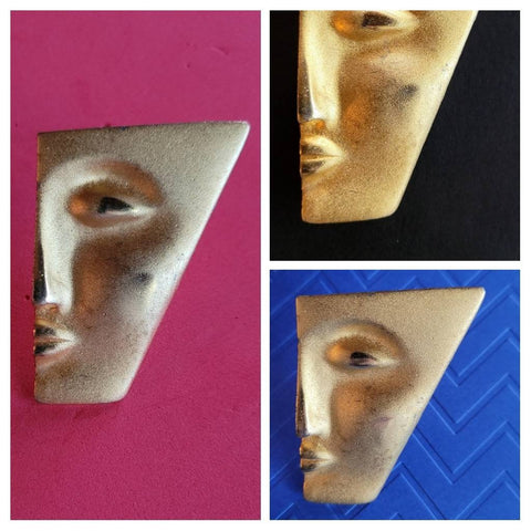 Faces Collection Brooch "My Better Half " is done on Soft Brushed Gold with Polished  Highlights  Features A Senual Sleek Sophisticated Face